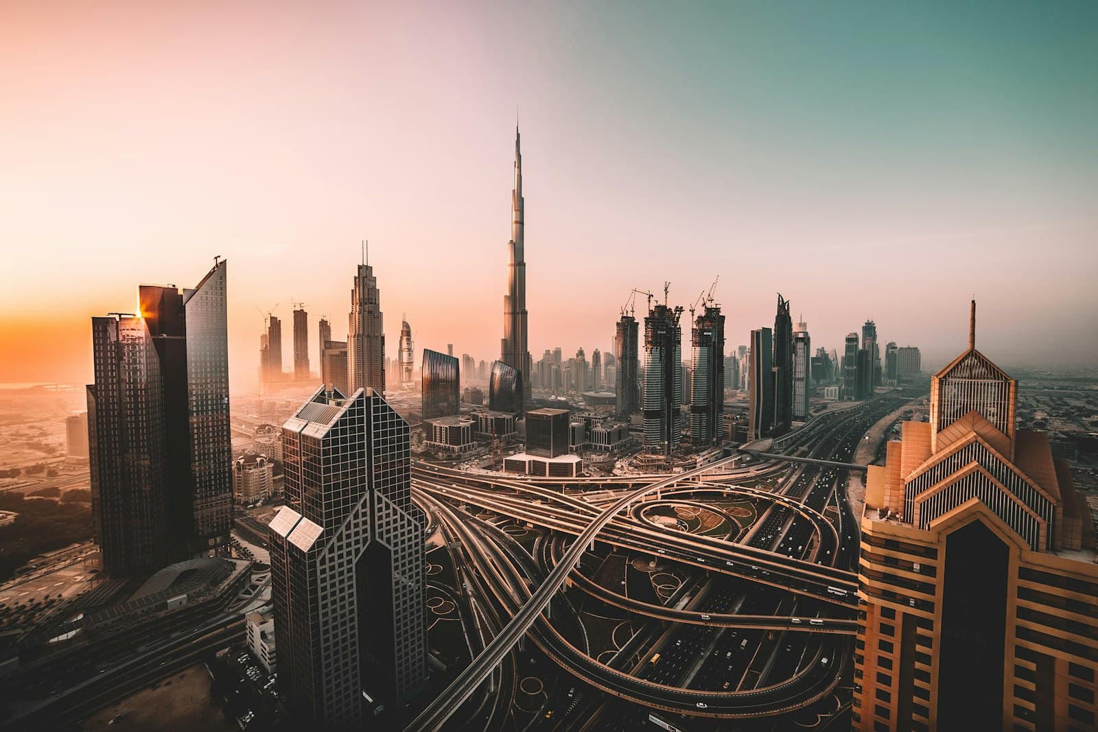 Dubai skyline and highways in warm evening light